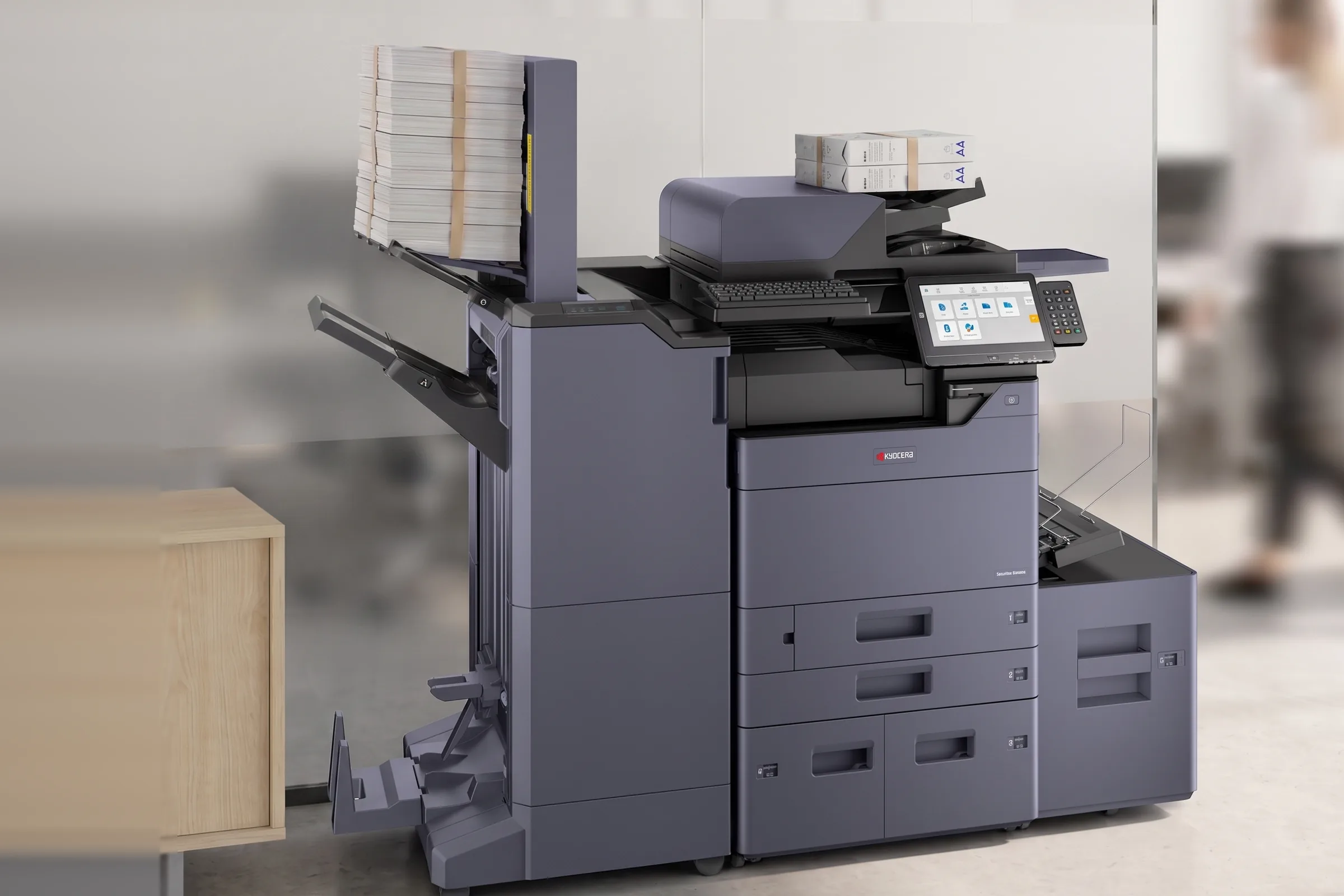 Banded stacks of finished client packs in the sorter of a leased Kyocera multifunction printer during a busy lodgement period