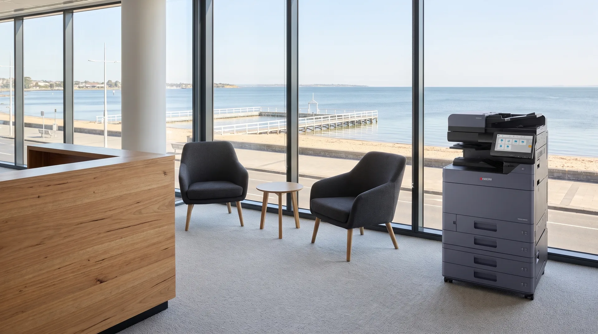 Kyocera photocopier on lease in a Geelong reception area overlooking the beach and bay