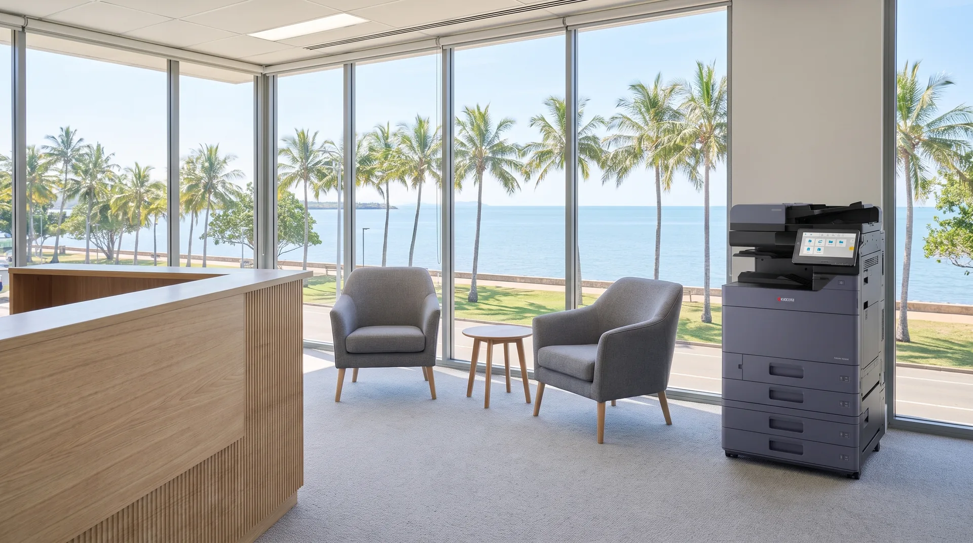 Kyocera photocopier on lease in a Townsville reception area overlooking the palm lined Strand foreshore