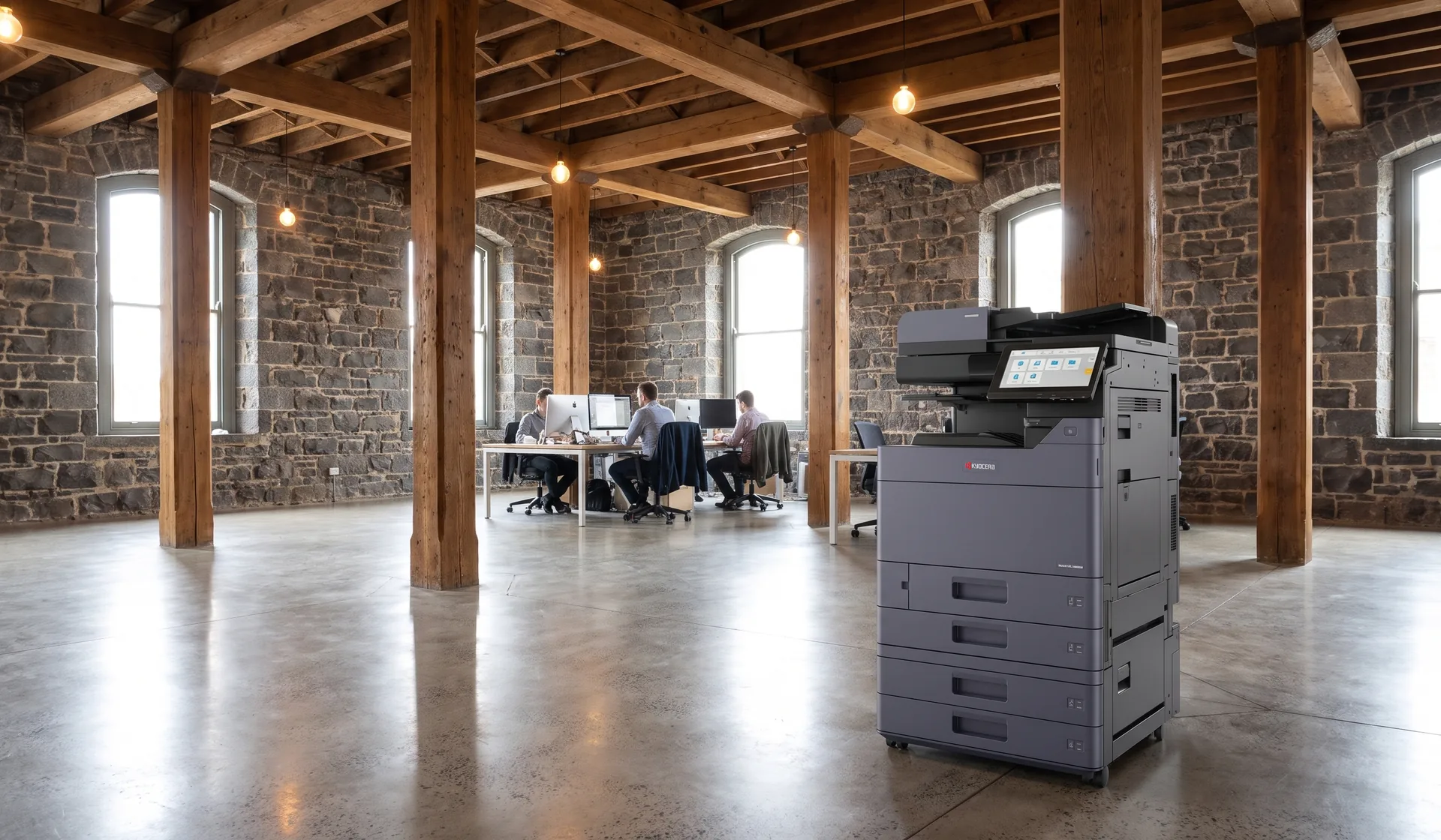 Kyocera multifunction printer in an open plan Geelong office inside a converted bluestone wool store